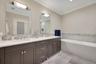 Double marble vanity, Waterworks fixtures and standalone soaking tub