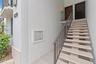 Stairs to unit on 2nd floor