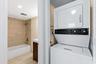 Guest bath and hall laundry closet