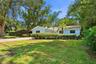 All on a Double 0.37 Acre Lot: 5 Bedroom, 3 Bath *POOL HOME* with a detached 2-Car Garage and added Carport.
