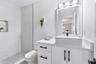 2nd Bathroom features a Walk-In Shower (no tub).