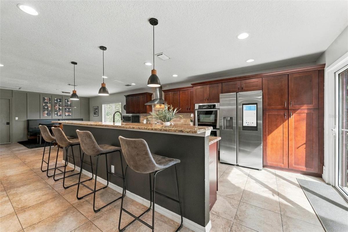 Flooded with natural light from accordian glass doors