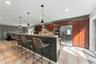 Flooded with natural light from accordian glass doors