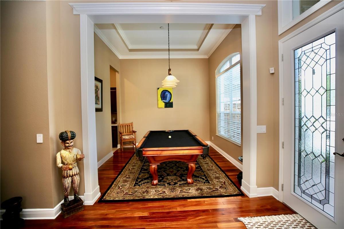 Formal Living Room being used to play Pool