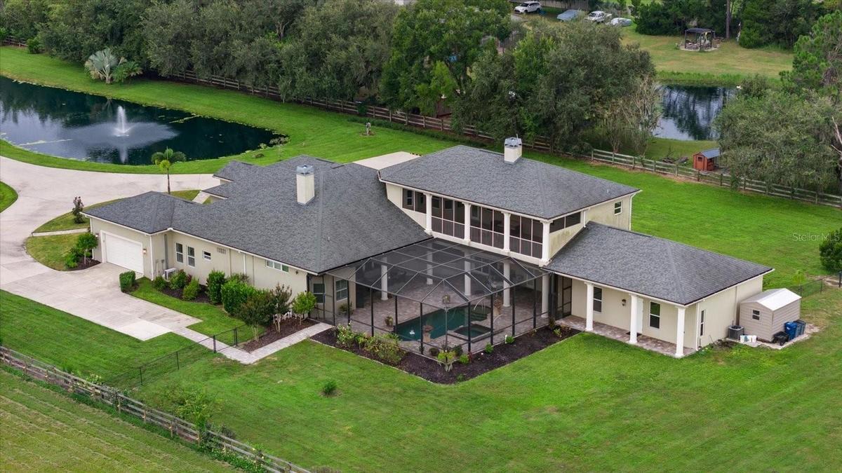Aerial view looking from the rear of the home