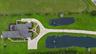 A direct view down on the home and entry lakes