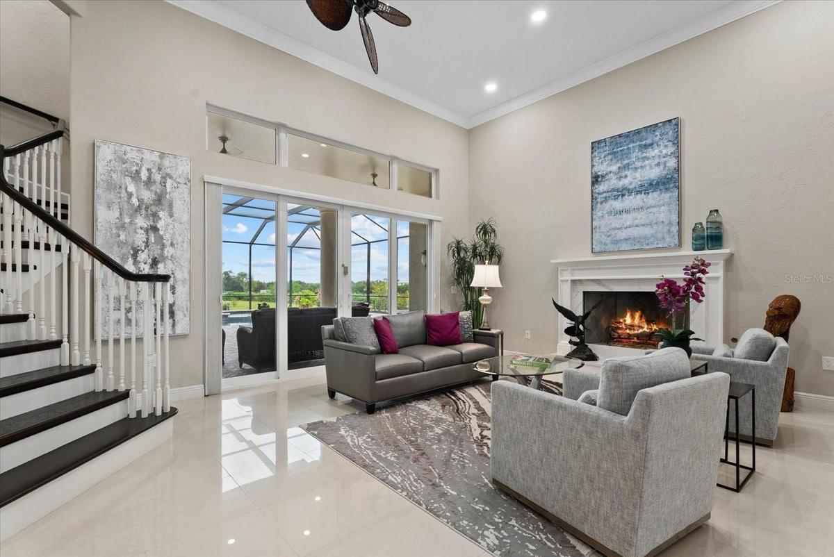 A gas fireplace provides a cozy setting for the a large living room