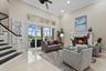 A gas fireplace provides a cozy setting for the a large living room