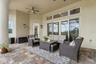 Back downstairs on the pool deck you'll find two separate lounges.  This one is off the living room and primary suite