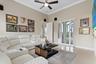 A short hallway from the family room leads to a media room