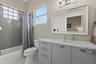 The ensuite bathroom off bedroom five upstairs