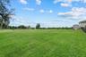 The front pasture behind the house