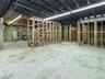 7 foot ceiling! Framed out for future rooms.