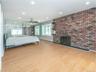 1st floor: Primary bedroom if you like with mirrored wall of closets. Bay window with storage.