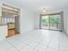 Dining room with sliding glass doors out to the deck. Great for bringing the party outside!