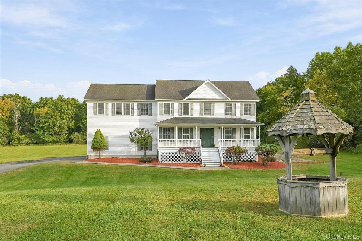 Surrounded by open lawn, the home enjoys a setting that feels spacious in every direction.
