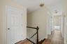 Head upstairs, where the home continues with generously proportioned bedrooms and plenty of living space.