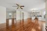 The main level flows effortlessly from one space to the next, with hardwood floors tying everything together.