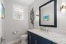 Remodeled and enlarged powder room