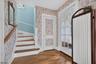 Foyer showing powder room