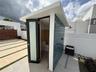 pool half bath with exterior shower