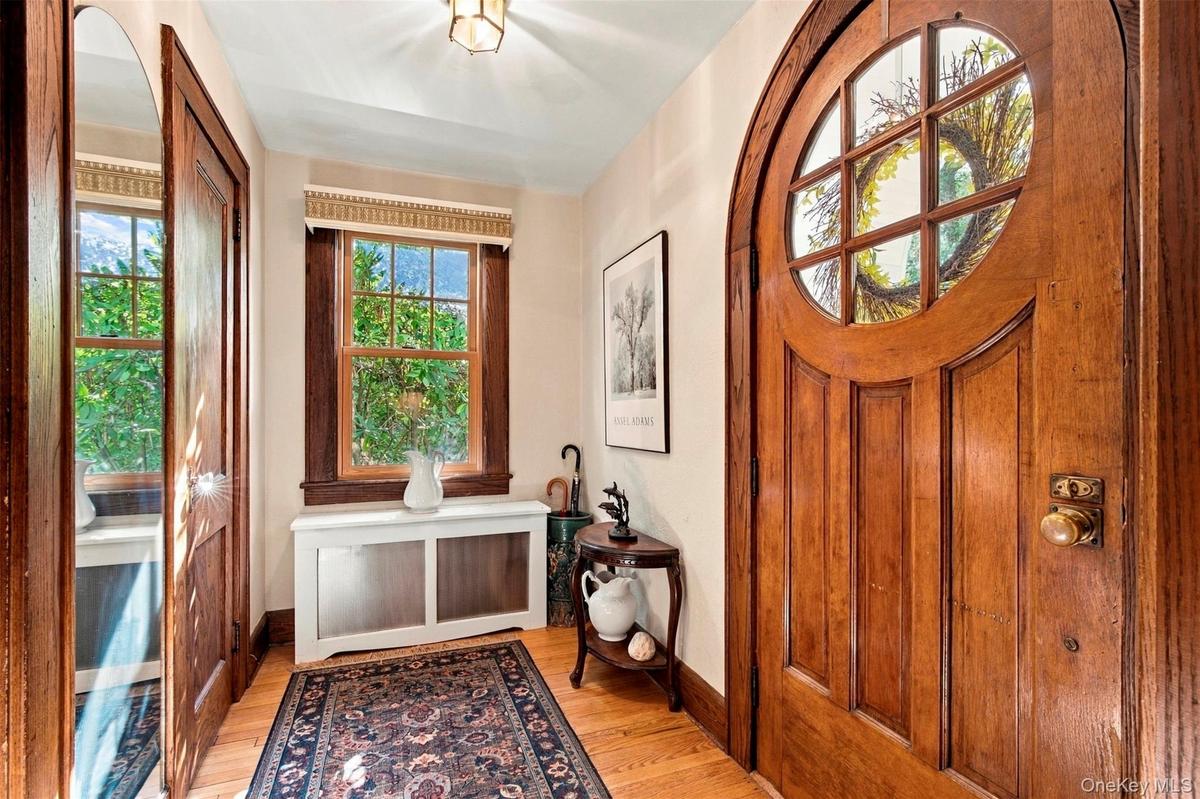 Evocative Tudor-Revival entry and foyer.