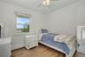 Second amply sized bedroom with great natural light and ceiling fan