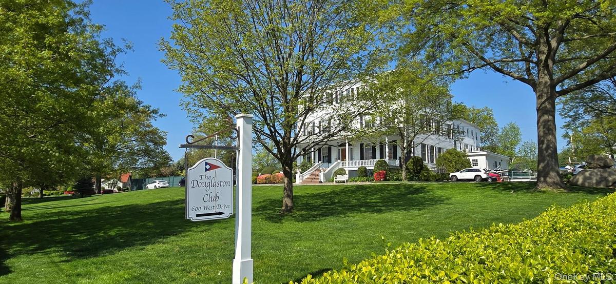 Douglaston Club is private club that offers, swimming, tennis, and fine dining