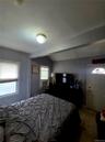 1st floor main bedroom with backyard access