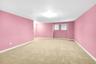 Finished basement with carpeting