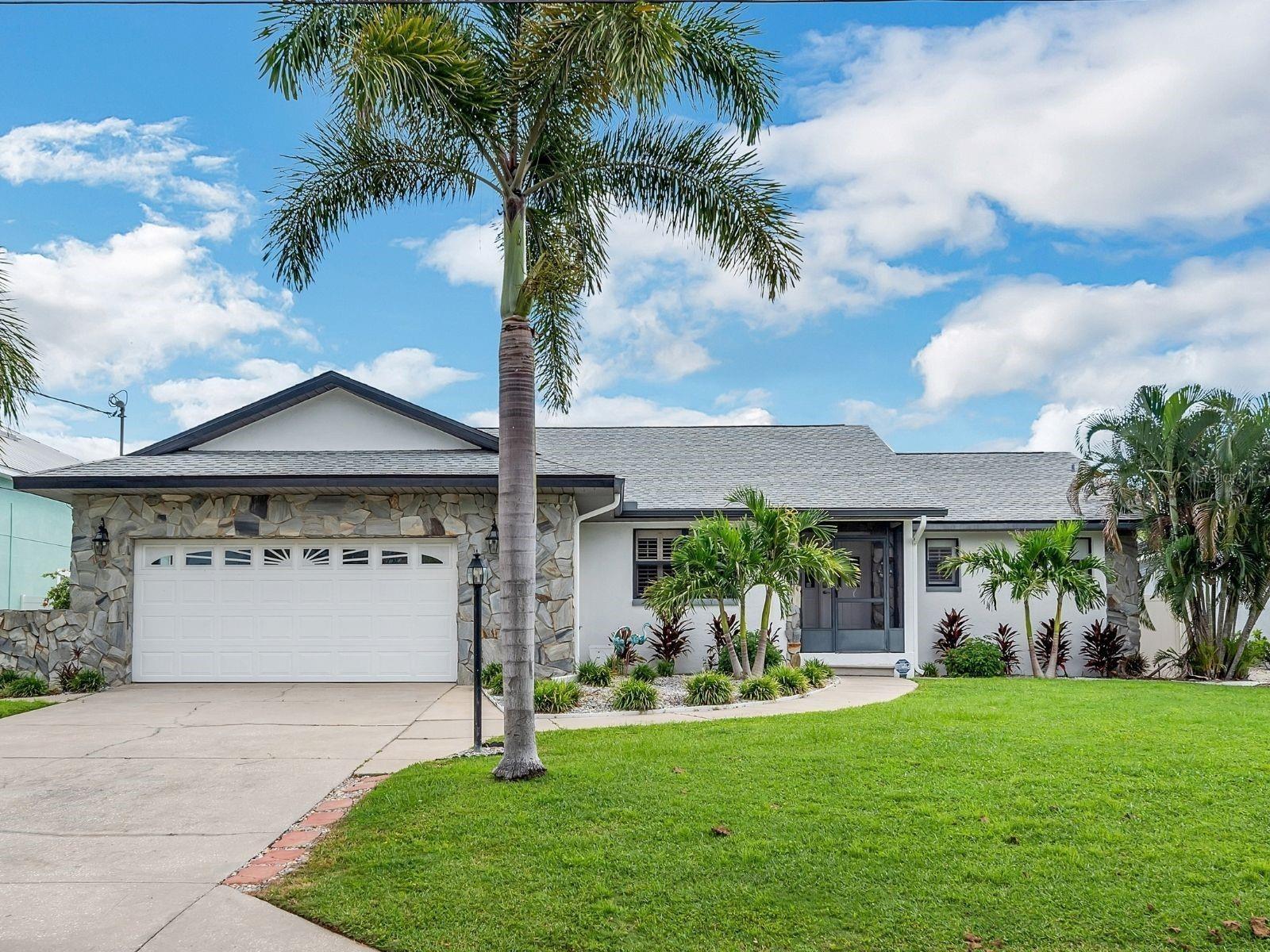 4 bed, 2 bath, heated pool, 2 boat lifts with Deep-Water Apollo Beach Canal Living with Direct Tampa Bay Access.