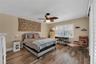 The split-bedroom floor plan offers privacy and flexibility with this secondary bedroom located on the opposite side on the home from the Primary Suit