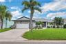 The home experienced no water damage during the past hurricane seasons and sits at a higher elevation than the adjacent canal.