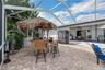 Next to the Tiki bar is the first of two outside showers.