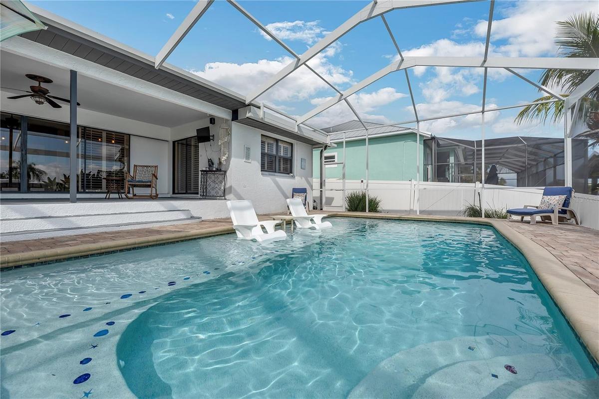 You will love this heated saltwater pool with a large shallow sun shelf for young kids and lounging.