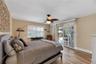 This secondary bedroom is located on the back of the home with private access to the lania.