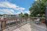 Boating enthusiasts will appreciate two private docks with boat lifts and a wood deck overlooking the canal.