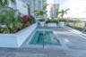Heated pool spa surrounded by lounge deck.
