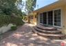French doors from Den lead to