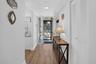 Entryway featuring wood-finish flooring, and recessed lighting