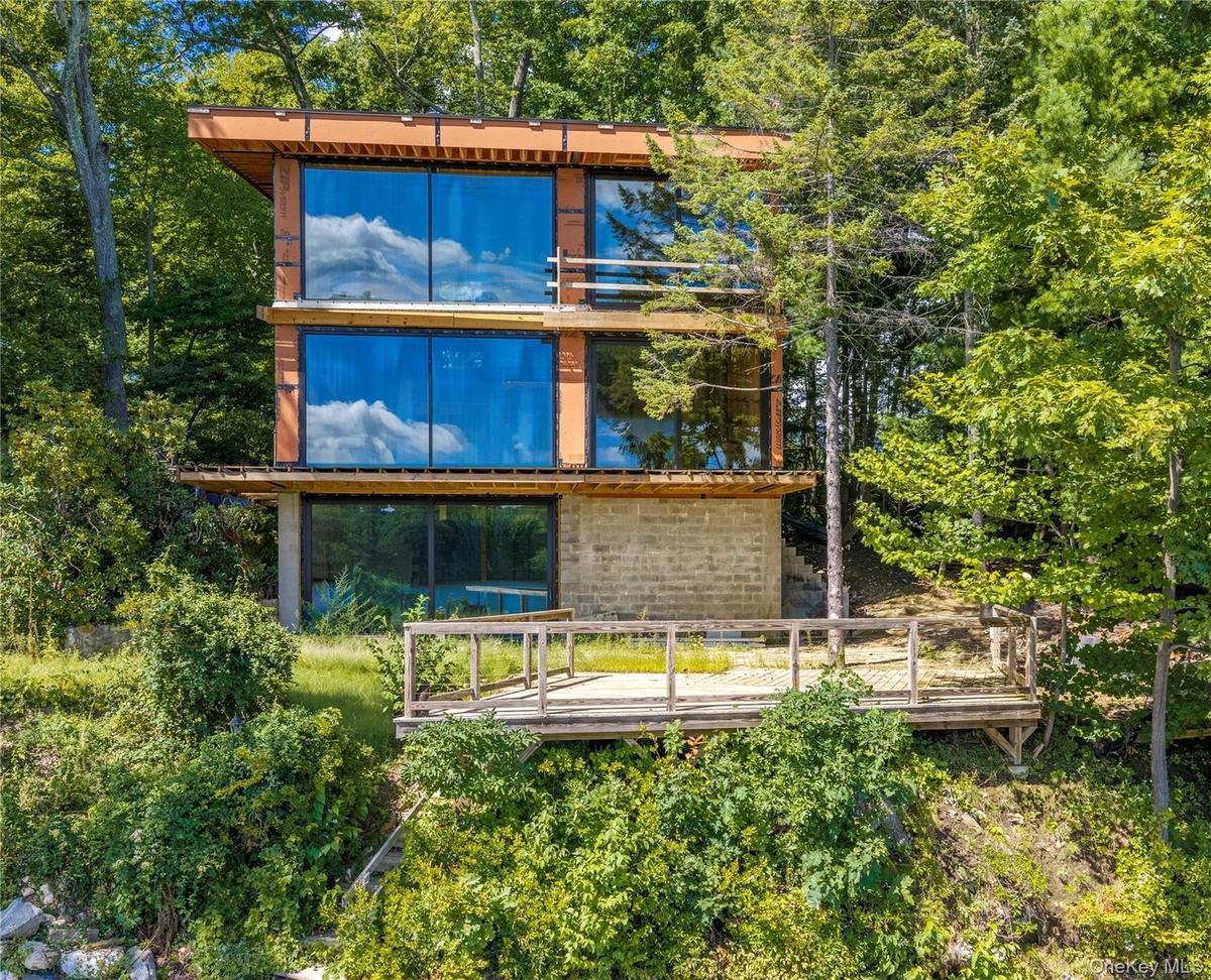 The current owner, together with a well-known local builder, has completed the heavy lifting. Major structural work is in place, permits have been sec