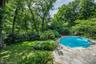 Flagstone patio - oval pool