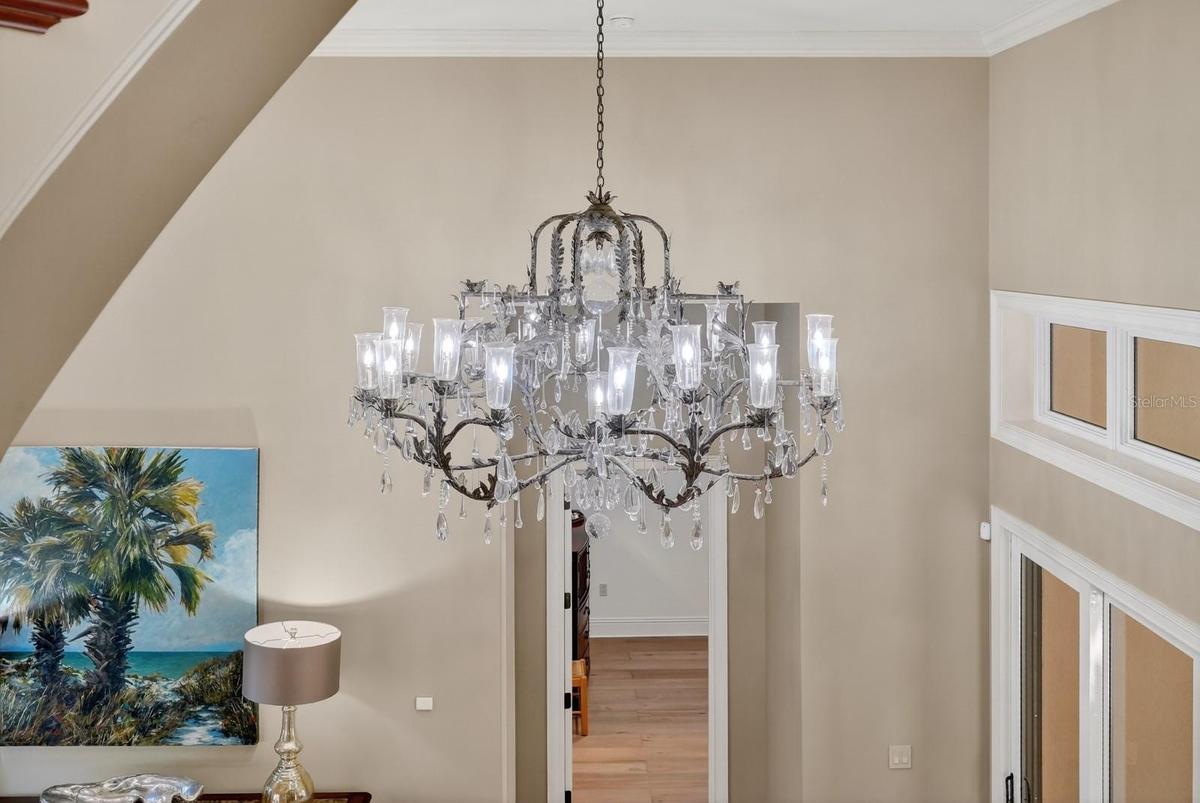 8' Antique Chandelier in Entry