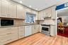 Custom Kitchen w/ stainless Range and Granite counters