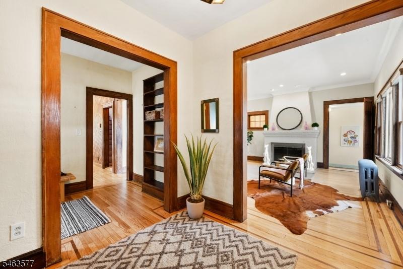 foyer with chestnut trim