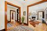 foyer with chestnut trim