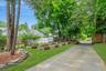 long driveway with raised beds