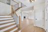 Foyer entrance featuring light hardwood / wood-style floors