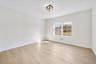 Empty room with light wood-type flooring