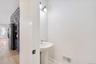 Bathroom with hardwood / wood-style floors